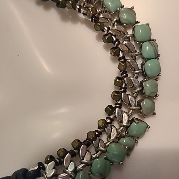 Fossil necklace with green stones and silver color. - Picture 4 of 6
